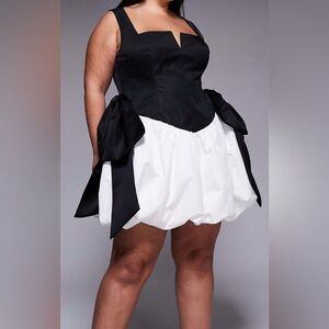 Elegant Black and White Dress with Bow Accents